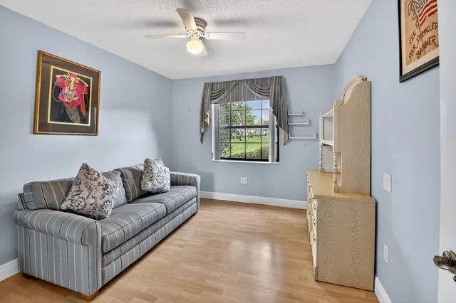 a very nice looking room with a sink a toilet and a mirror