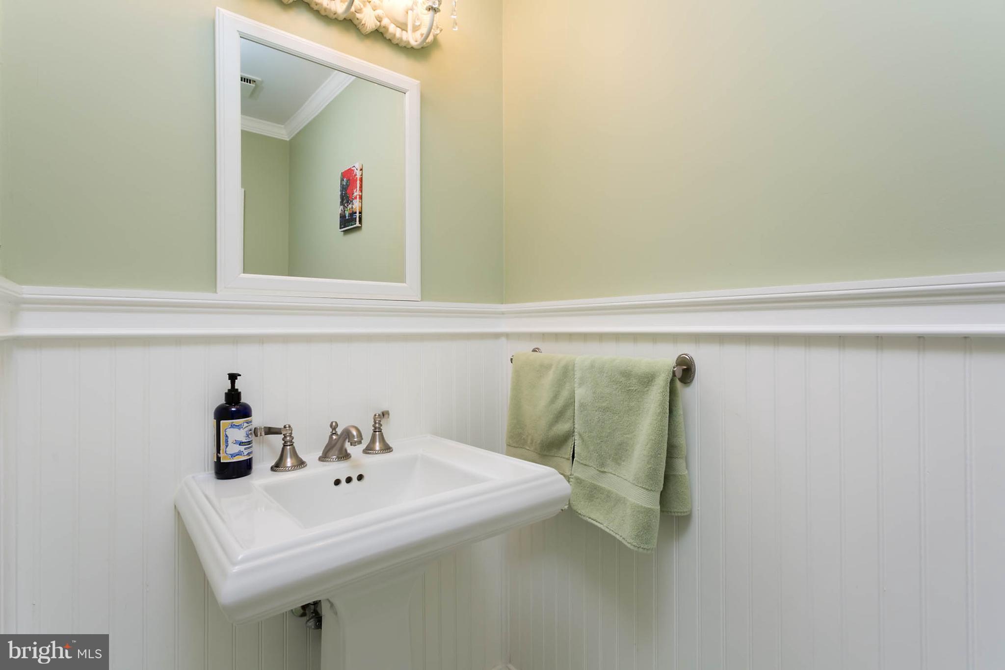 5106 Beaverbrook Road Columbia, MD 21044 - Photo 11 of 30 a bathroom with a sink and a mirror