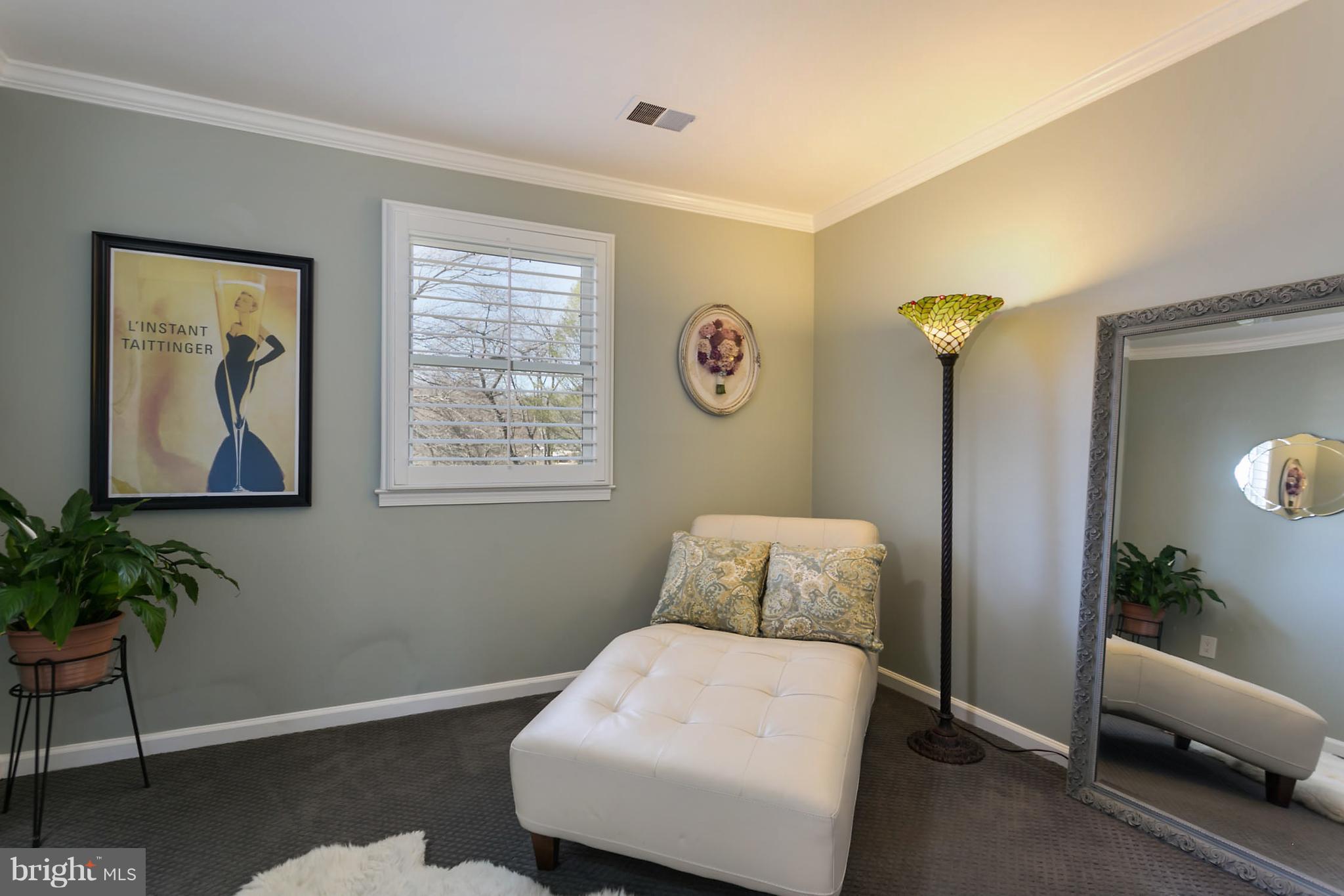 5106 Beaverbrook Road Columbia, MD 21044 - Photo 17 of 30 a bedroom with a bed and a potted plant