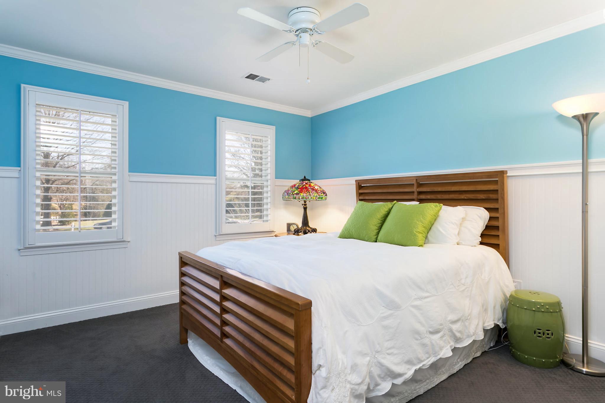 5106 Beaverbrook Road Columbia, MD 21044 - Photo 18 of 30 a bedroom with a bed and a chandelier