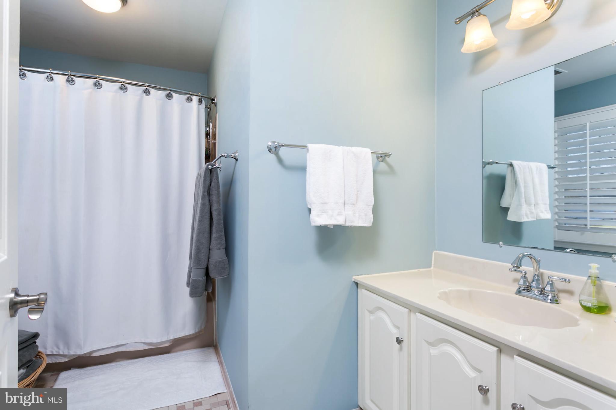 5106 Beaverbrook Road Columbia, MD 21044 - Photo 22 of 30 a bathroom with a sink and a mirror