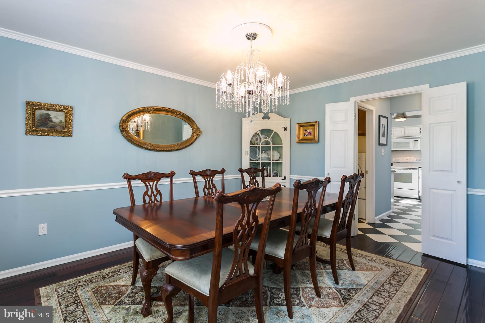 5106 Beaverbrook Road Columbia, MD 21044 - Photo 9 of 30 a view of a dining room with furniture and wooden floor