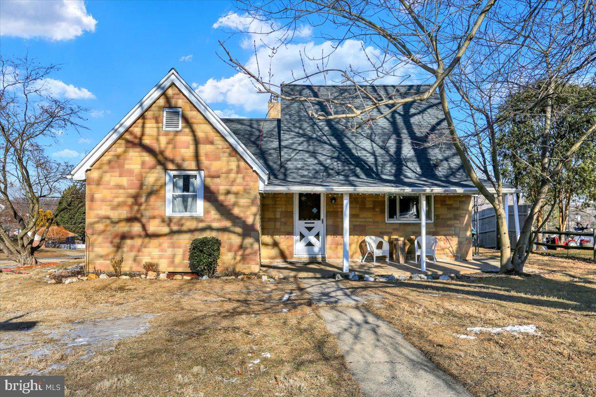 321 Pershing Boulevard Reading, PA 19607 - Photo 1 of 36 a view of a house with a yard