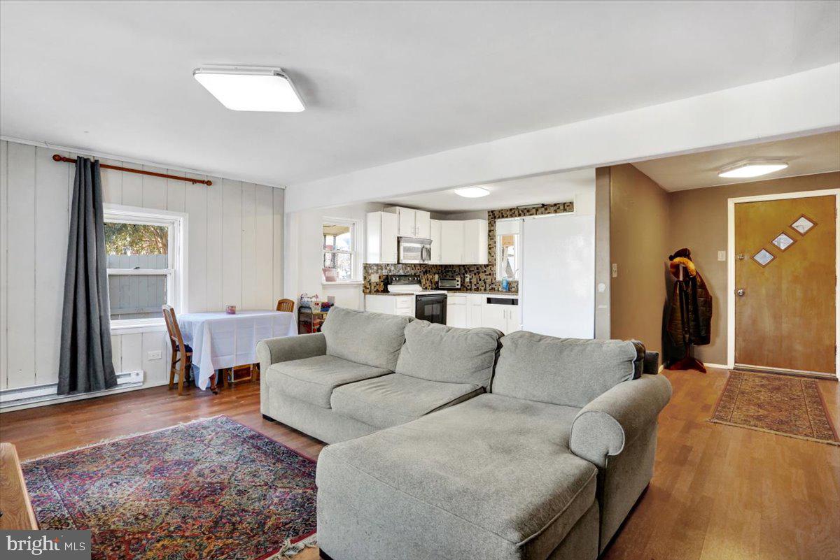 321 Pershing Boulevard Reading, PA 19607 - Photo 11 of 36 a living room with furniture and a large window