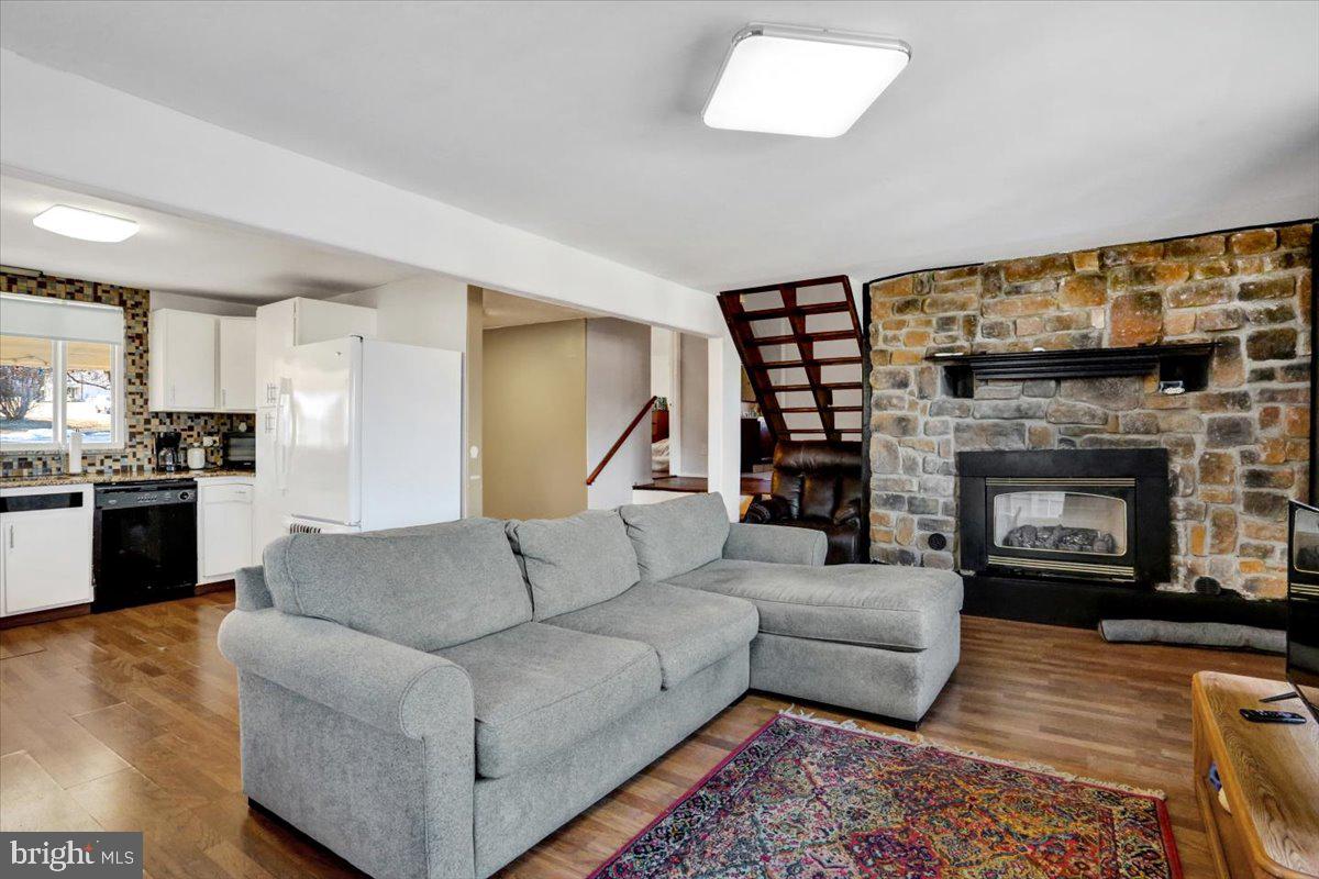 321 Pershing Boulevard Reading, PA 19607 - Photo 12 of 36 a living room with furniture and a fireplace