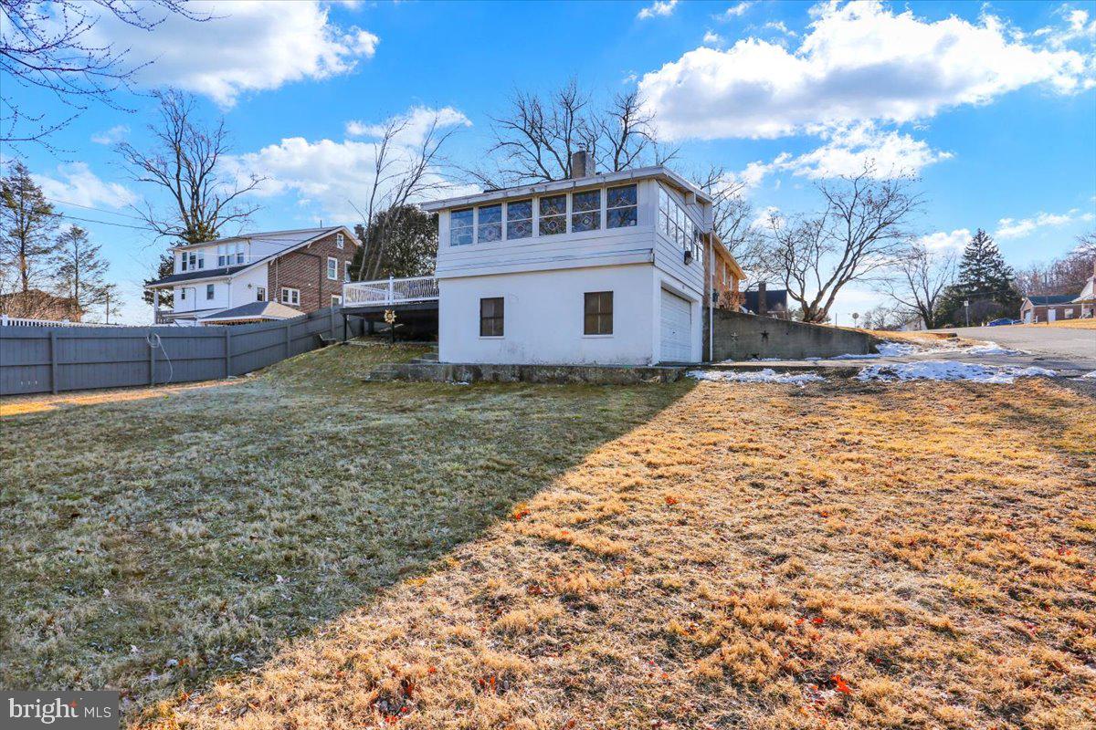 321 Pershing Boulevard Reading, PA 19607 - Photo 5 of 36 a view of a house with a yard