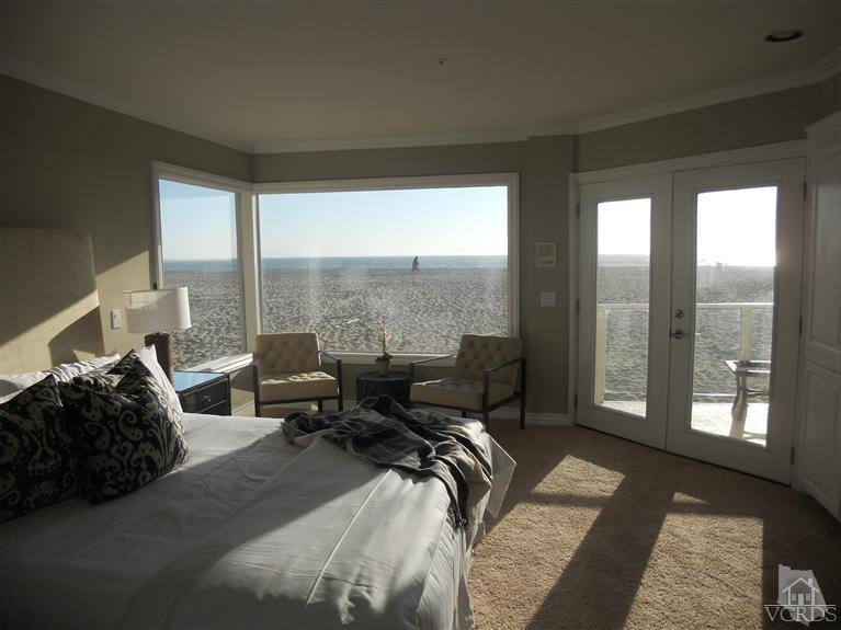 1011 Mandalay Beach Road Oxnard, CA 93035 - Photo 13 of 13 a living room with furniture and floor to ceiling windows