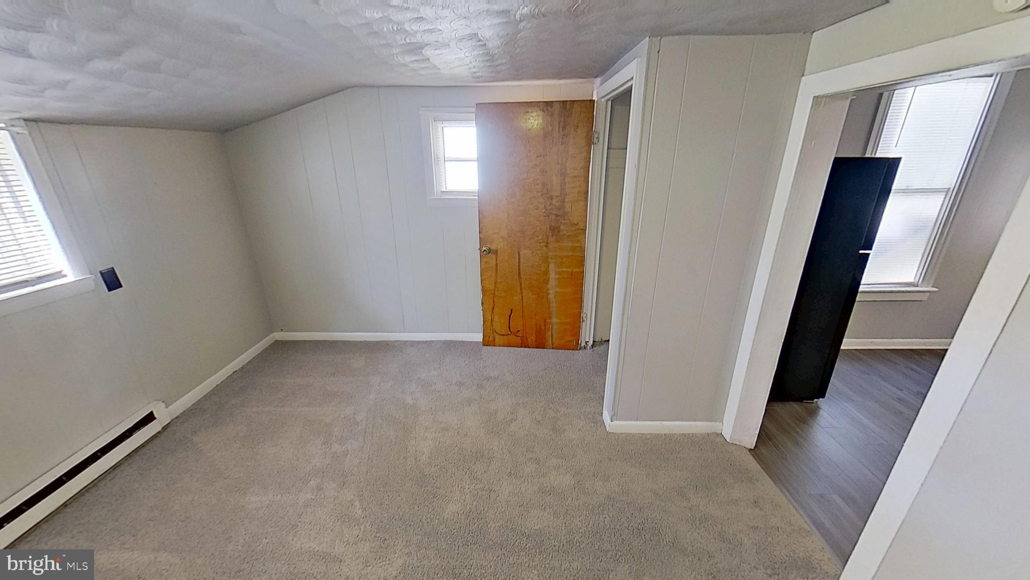 648 Broadway, Unit B Hanover, PA 17331 - Photo 3 of 12 an empty room with windows