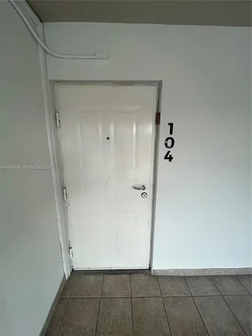 a view of a swimming pool with a terrace