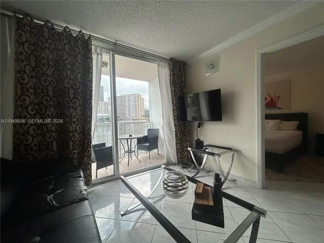 a bathroom with a sink toilet and mirror