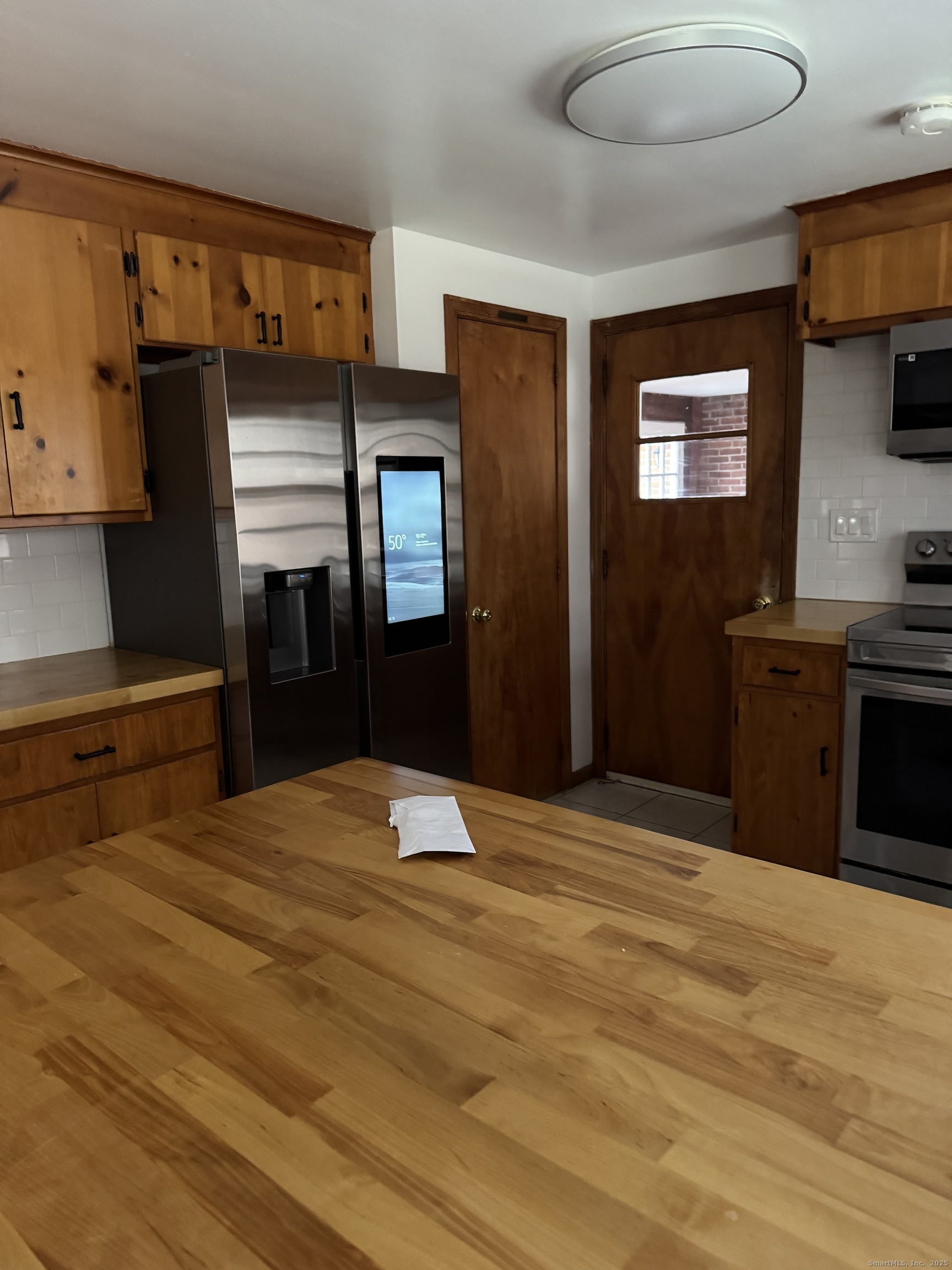 85 Mountain Road Norfolk, CT 06058 - Photo 3 of 15 a bedroom with a bed and a dresser