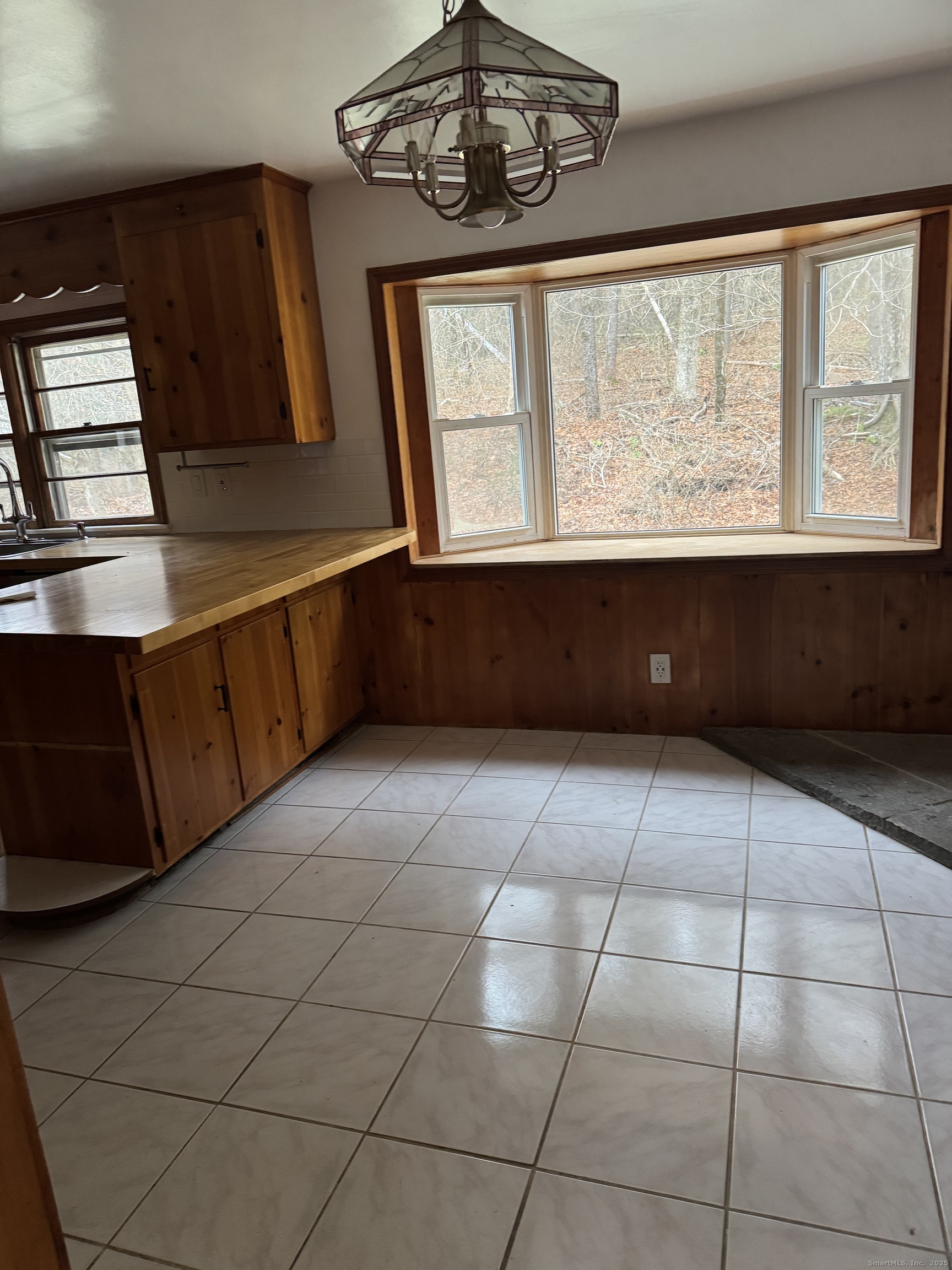 85 Mountain Road Norfolk, CT 06058 - Photo 4 of 15 a view of an empty room with a window