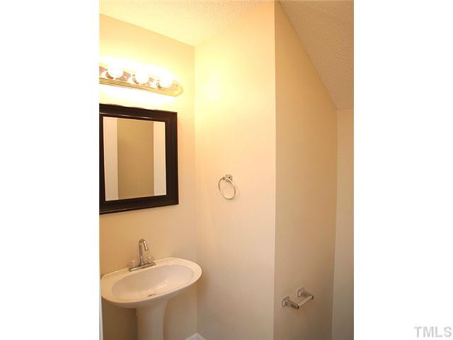 5518 Golden Moss Trail Raleigh, NC 27613 - Photo 13 of 13 This is an upgrade for this floorplan. Downstairs features a full bath as well as this half bath. Bathroom