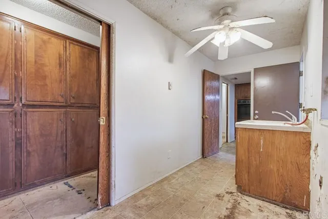 a view of a lush green hillside and a building