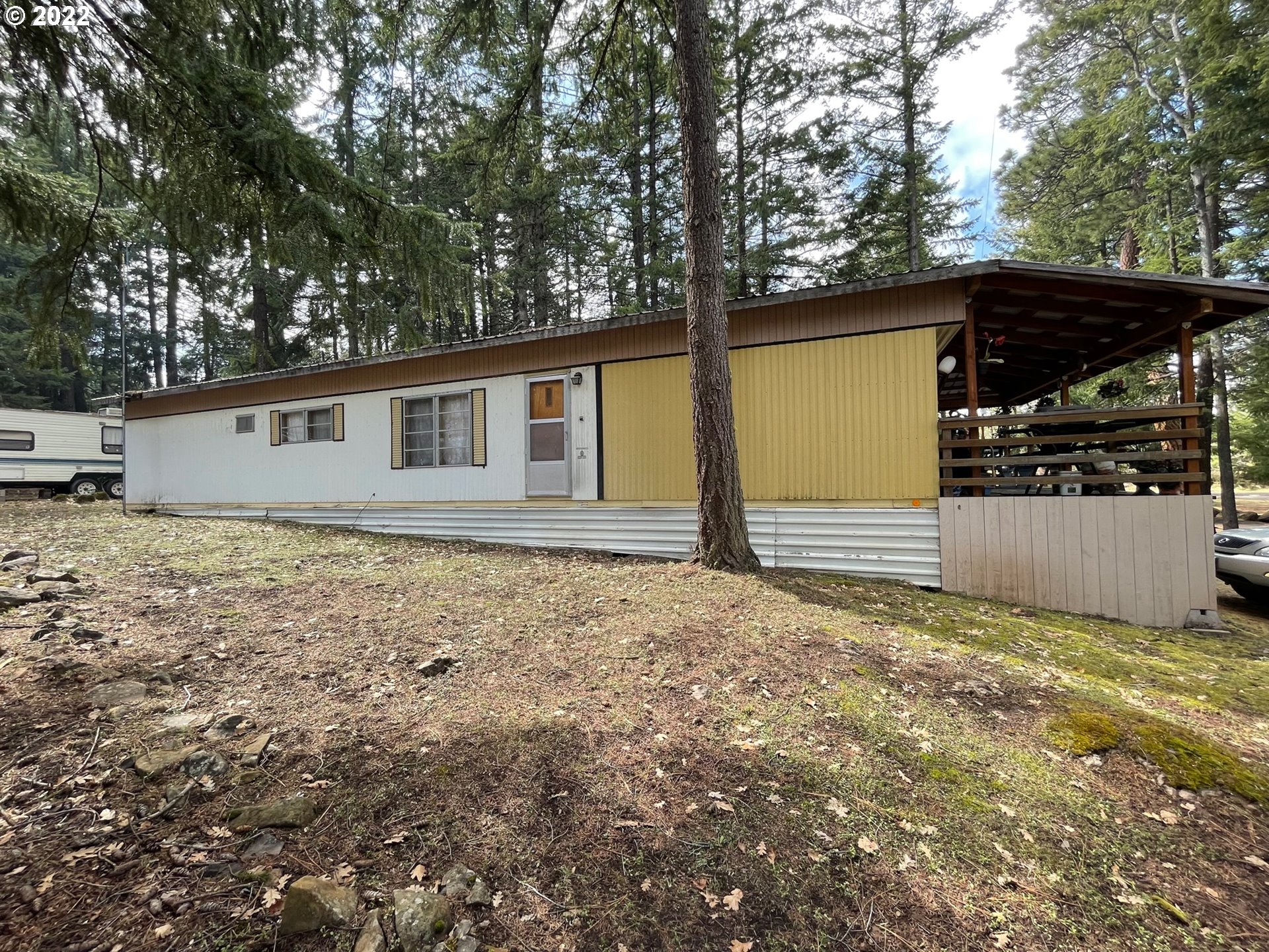 235 Lake View Loop Tygh Valley, OR 97063 - Photo 2 of 24 a view of a house with a yard
