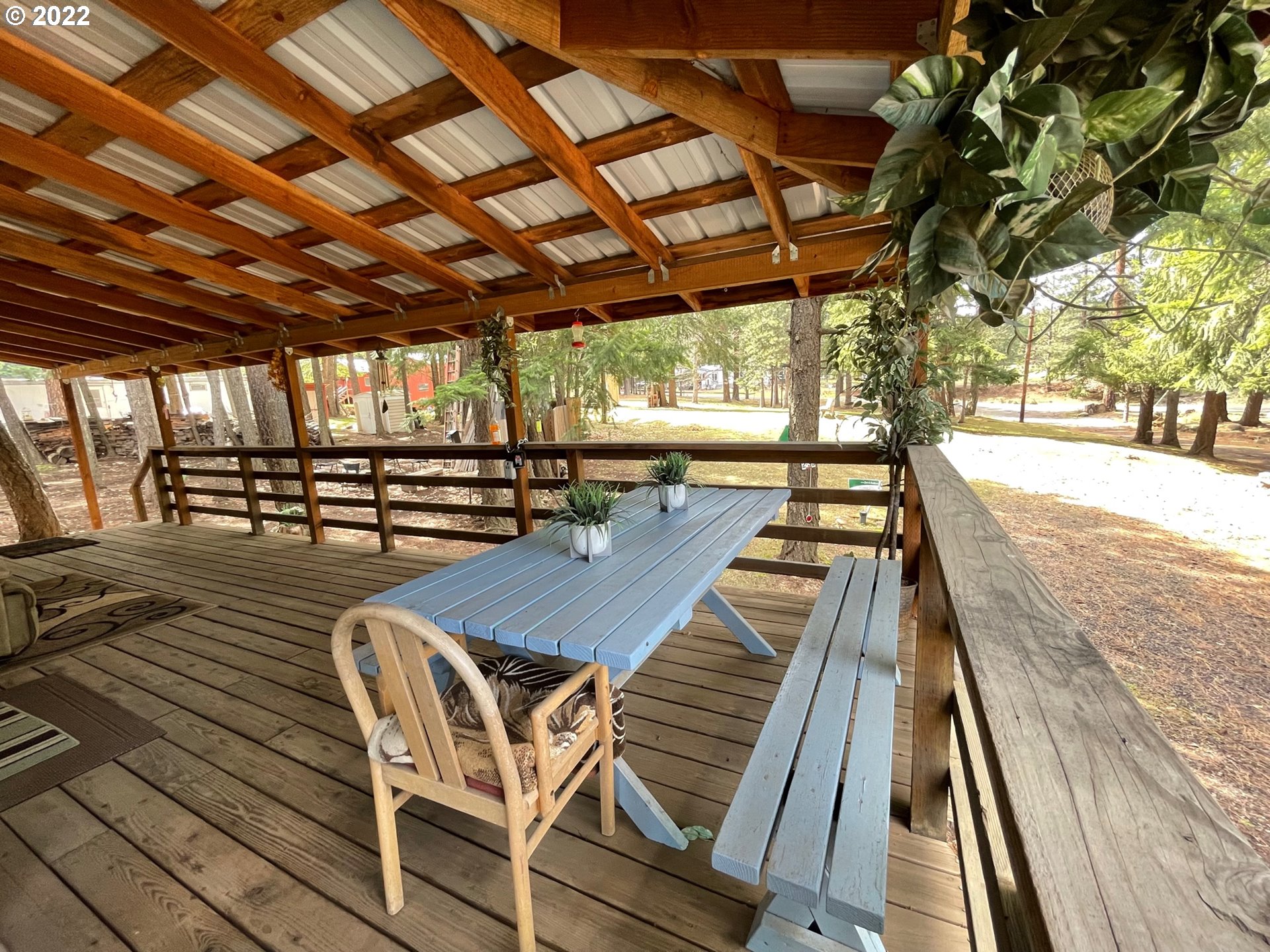 235 Lake View Loop Tygh Valley, OR 97063 - Photo 21 of 24 a sitting area with wooden racks on wall