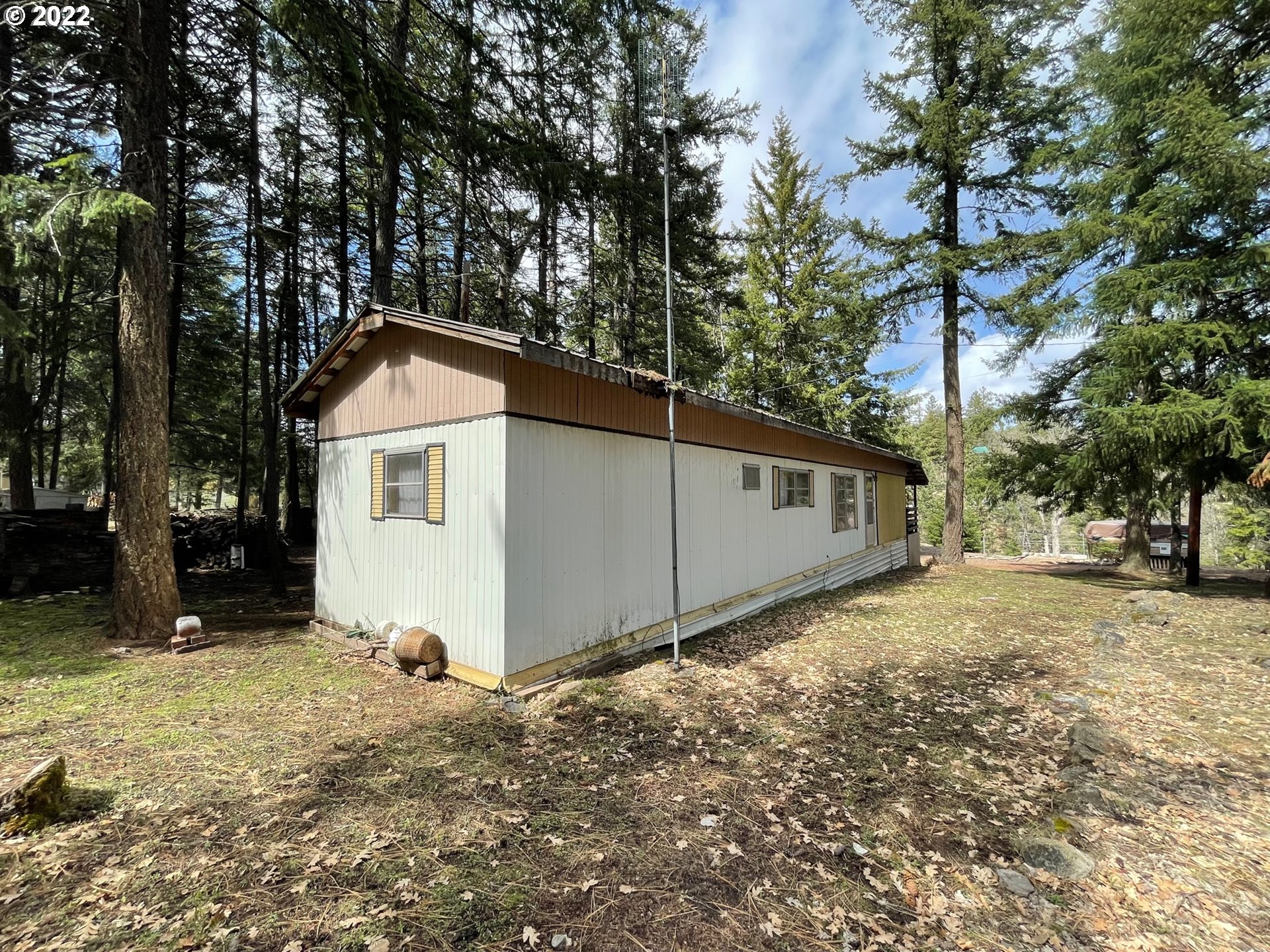 235 Lake View Loop Tygh Valley, OR 97063 - Photo 4 of 24 a view of a house with a yard