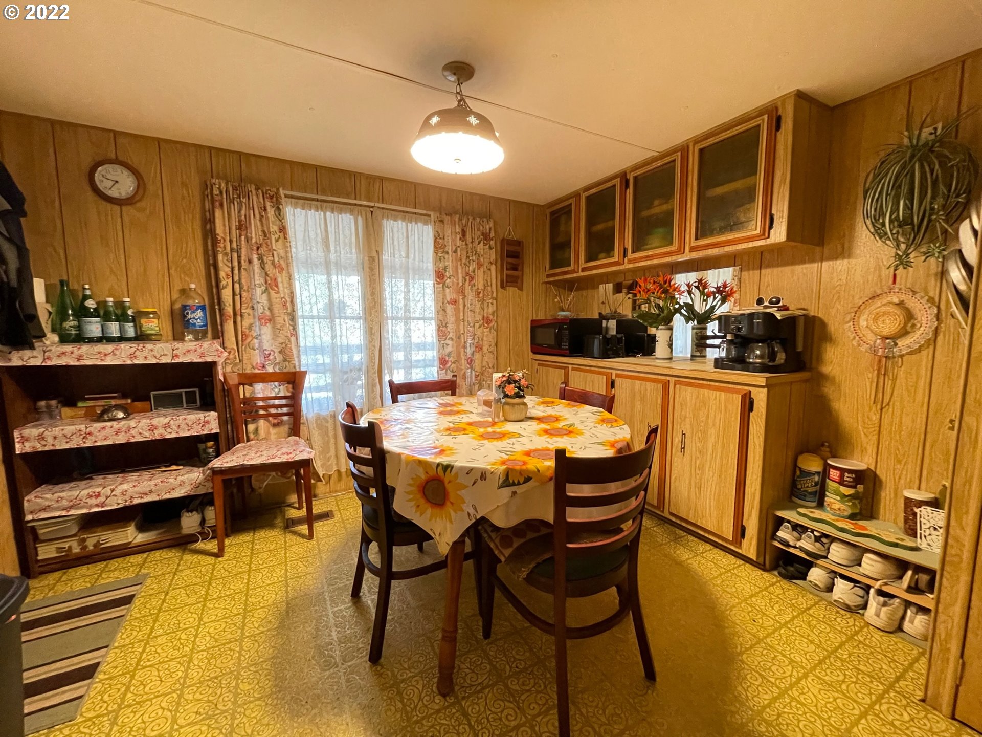 235 Lake View Loop Tygh Valley, OR 97063 - Photo 5 of 24 a view of a dining room with furniture and chandelier