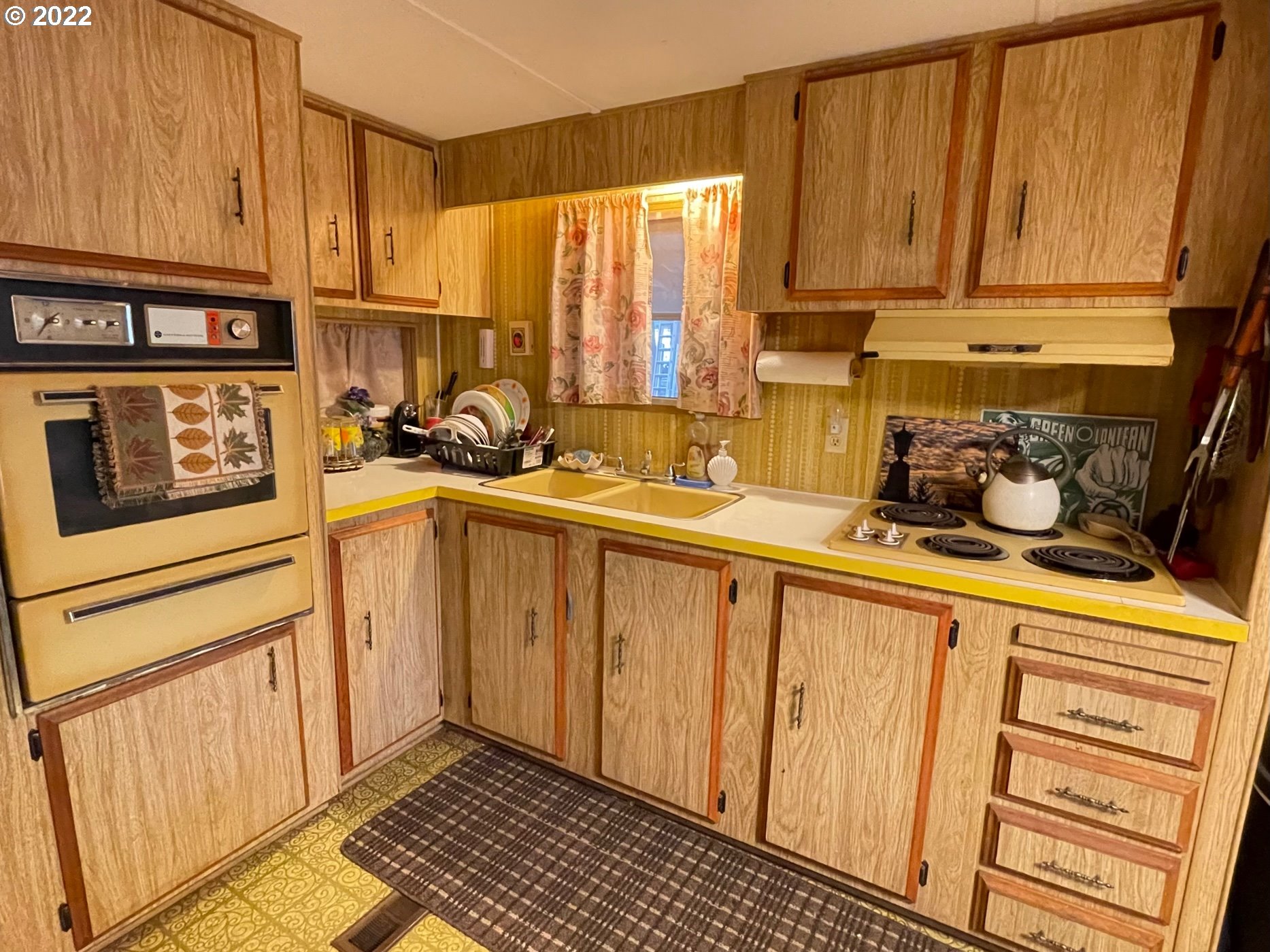 235 Lake View Loop Tygh Valley, OR 97063 - Photo 6 of 24 a kitchen with sink cabinets and window
