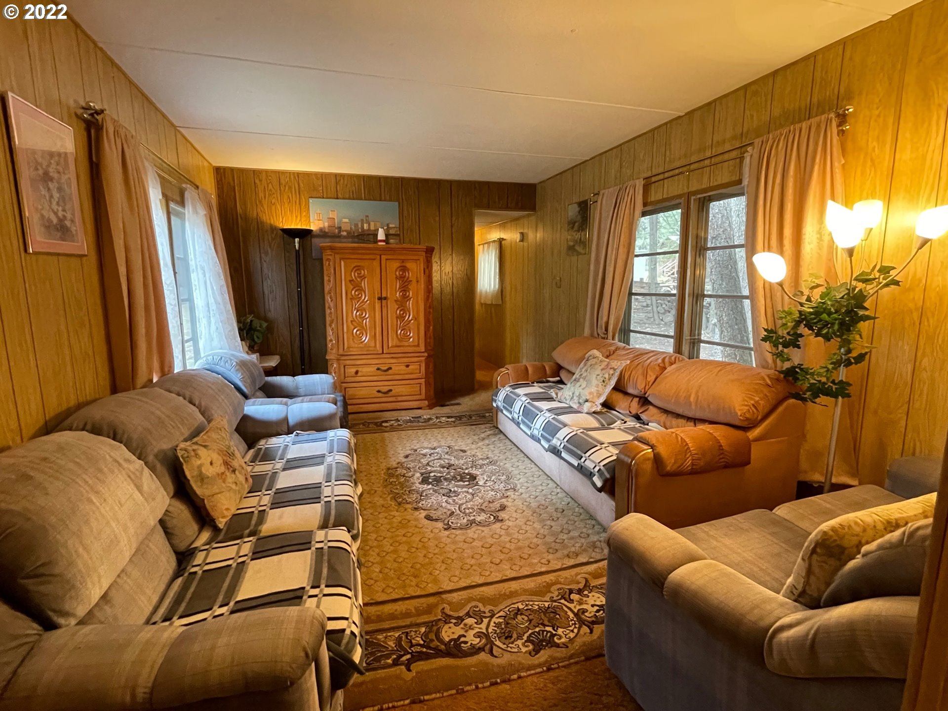 235 Lake View Loop Tygh Valley, OR 97063 - Photo 8 of 24 a living room with furniture and a large window
