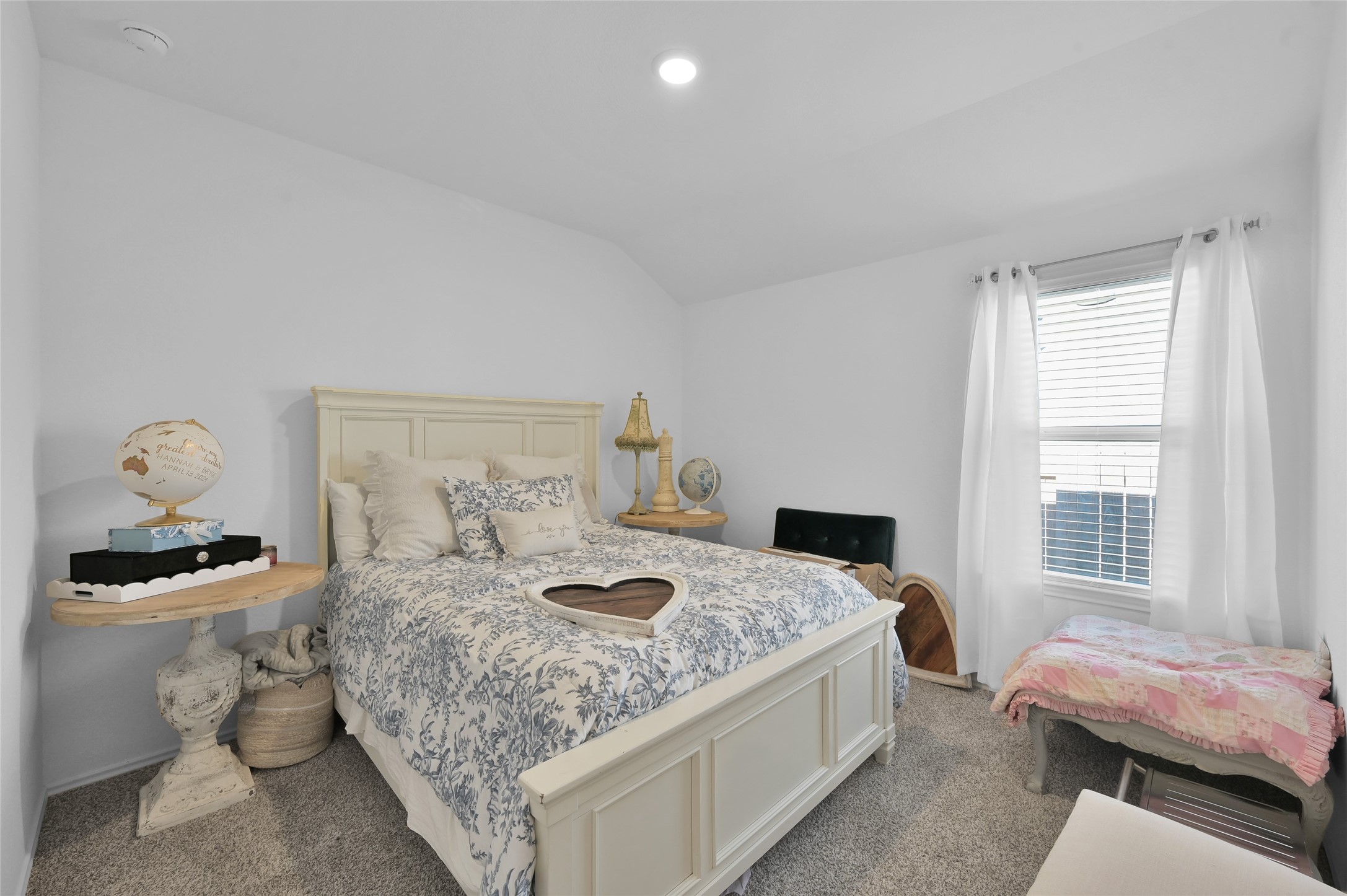 12369 Carib Crossing Lane Conroe, TX 77304 - Photo 29 of 43 a bedroom with a bed and large window