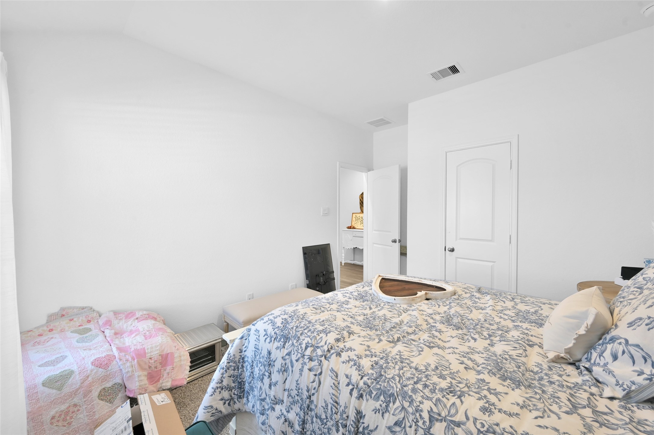 12369 Carib Crossing Lane Conroe, TX 77304 - Photo 30 of 43 a bedroom with a bed and a closet