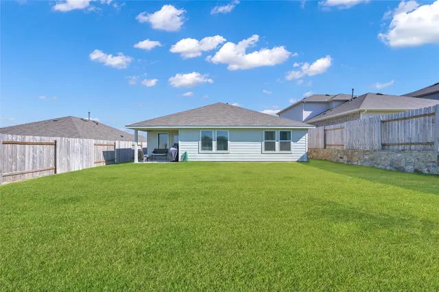 a house view with a garden space