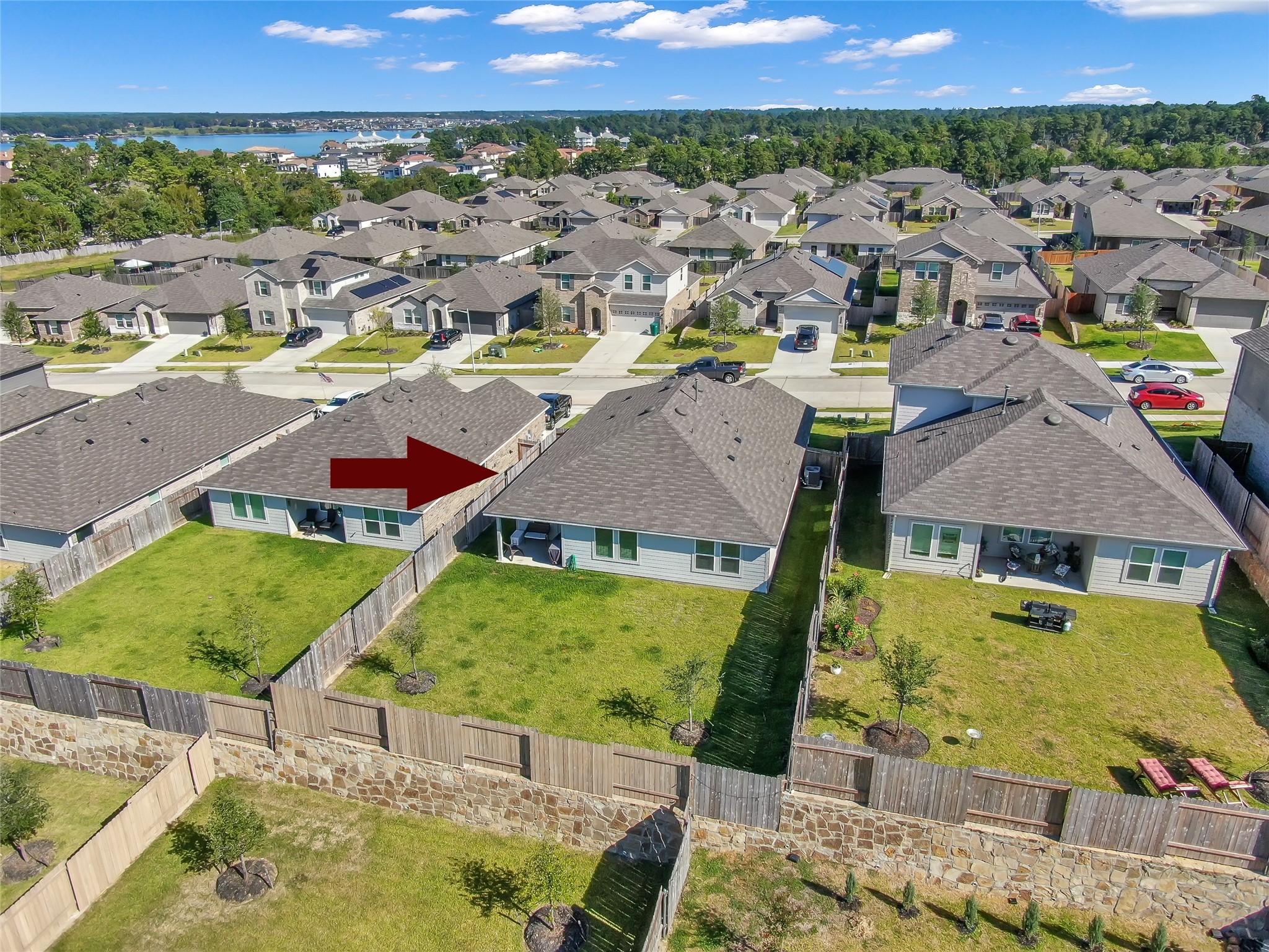 12369 Carib Crossing Lane Conroe, TX 77304 - Photo 40 of 43 a view of residential houses with outdoor space and swimming pool