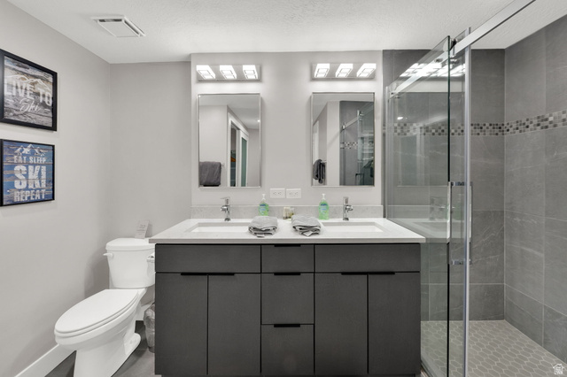 50 Shadow Ridge Road, Unit 4209 Park City, UT 84060 - Photo 20 of 50 Dual vanity with white undermount sinks and quartz countertops