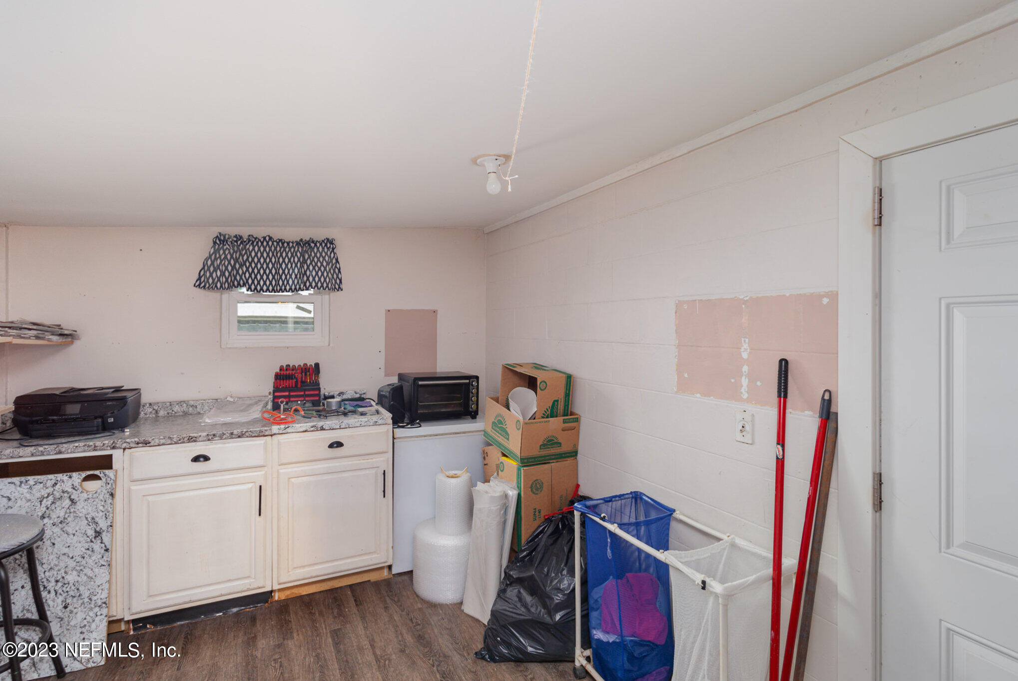 145 North Orange Street Starke, FL 32091 - Photo 12 of 26 a room with storage and utility