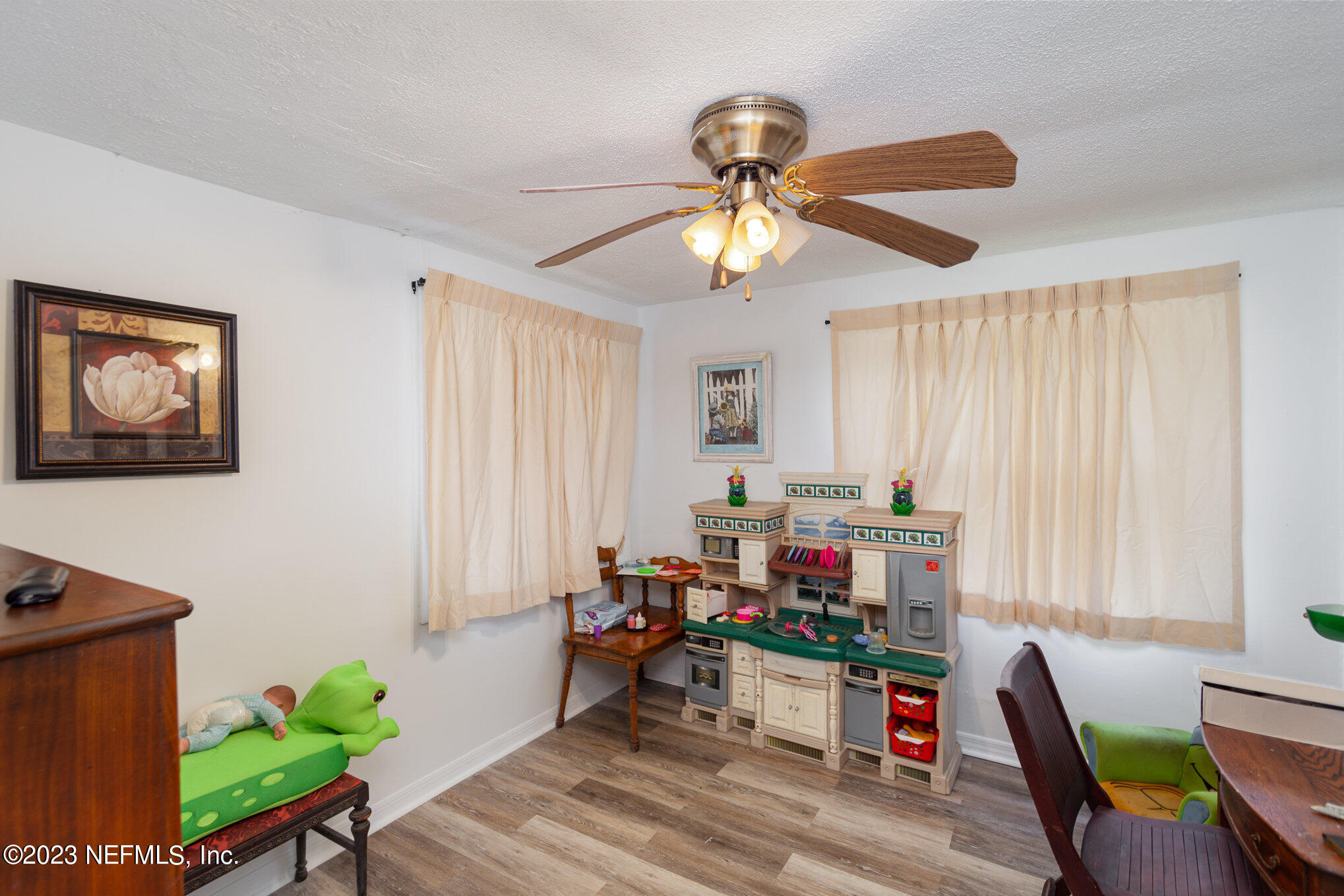 145 North Orange Street Starke, FL 32091 - Photo 13 of 26 a living room with furniture and a window