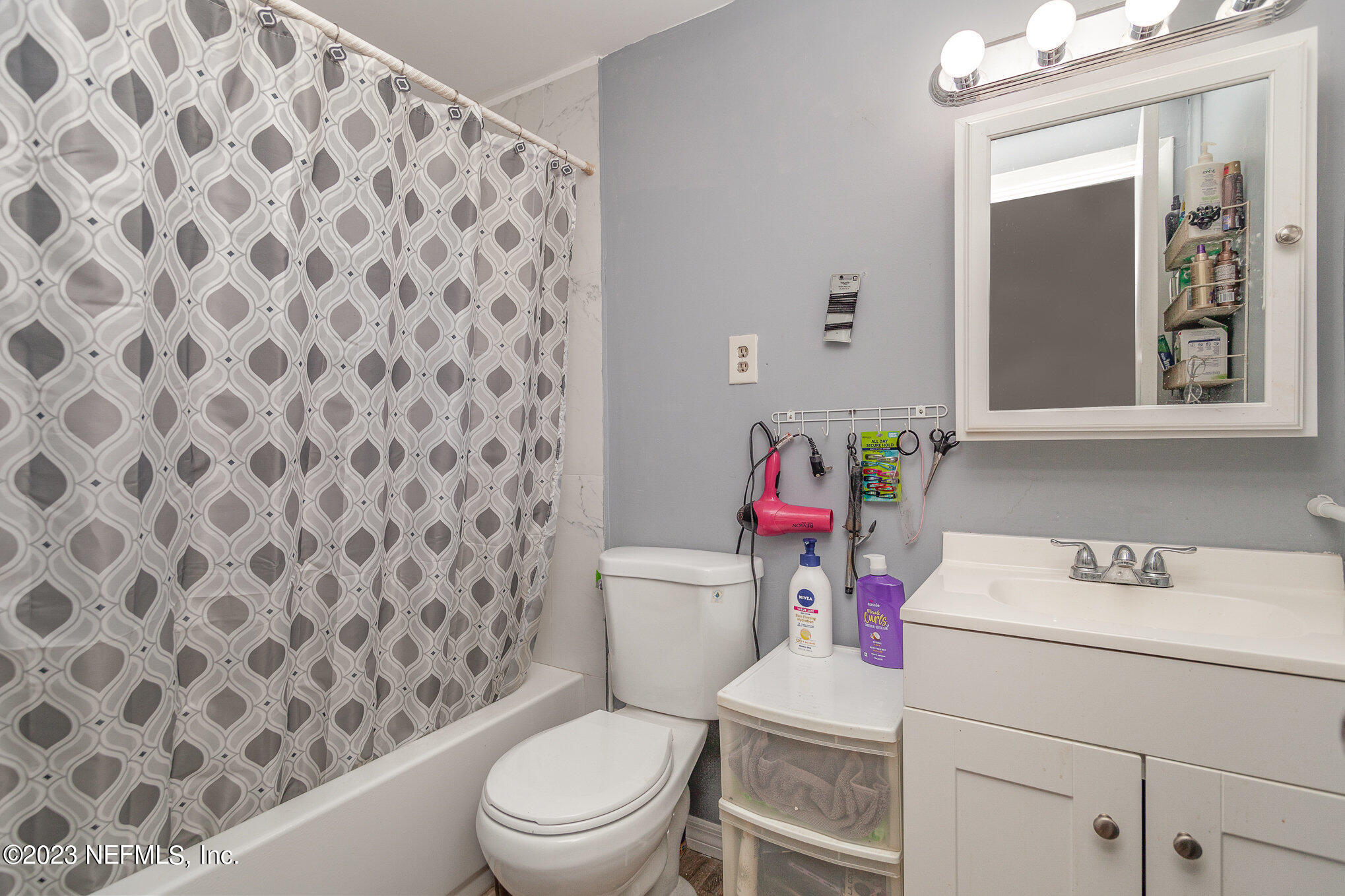 145 North Orange Street Starke, FL 32091 - Photo 20 of 26 a bathroom with a toilet and a sink