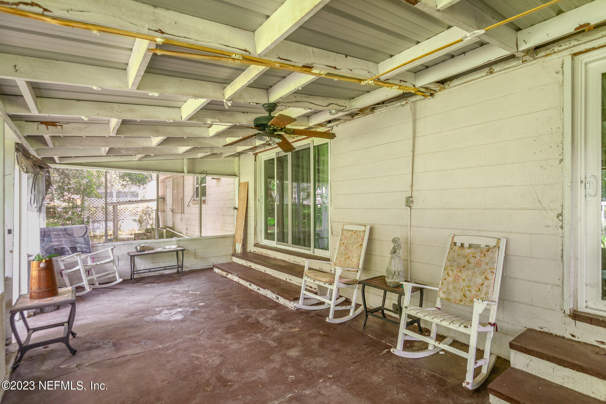 145 North Orange Street Starke, FL 32091 - Photo 21 of 26 a living room with furniture and a window