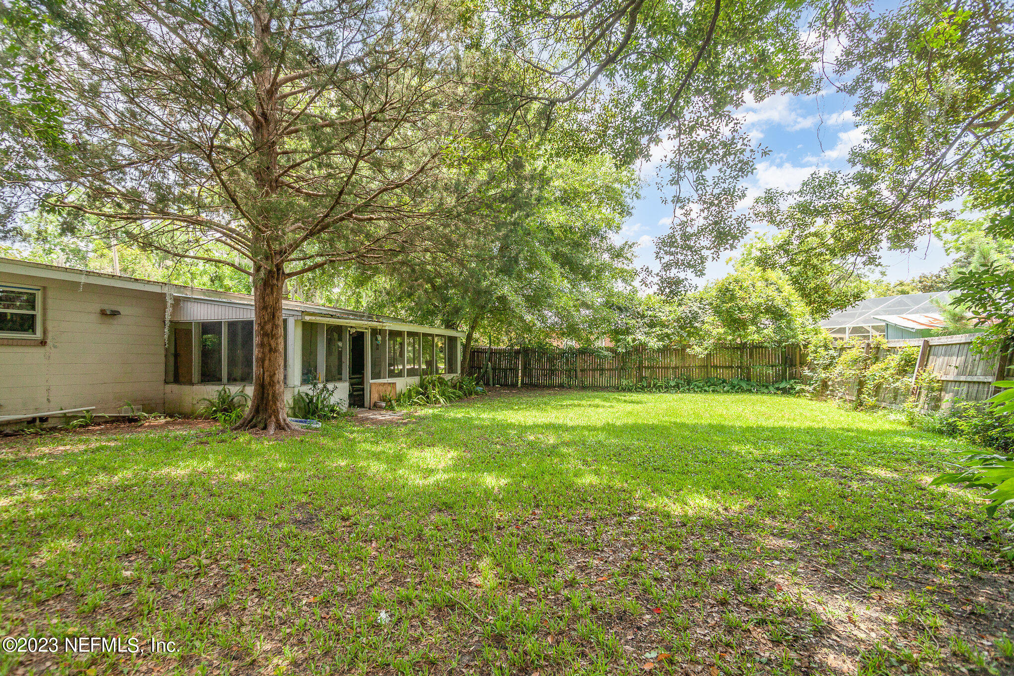 145 North Orange Street Starke, FL 32091 - Photo 25 of 26 a backyard of a house with seating space