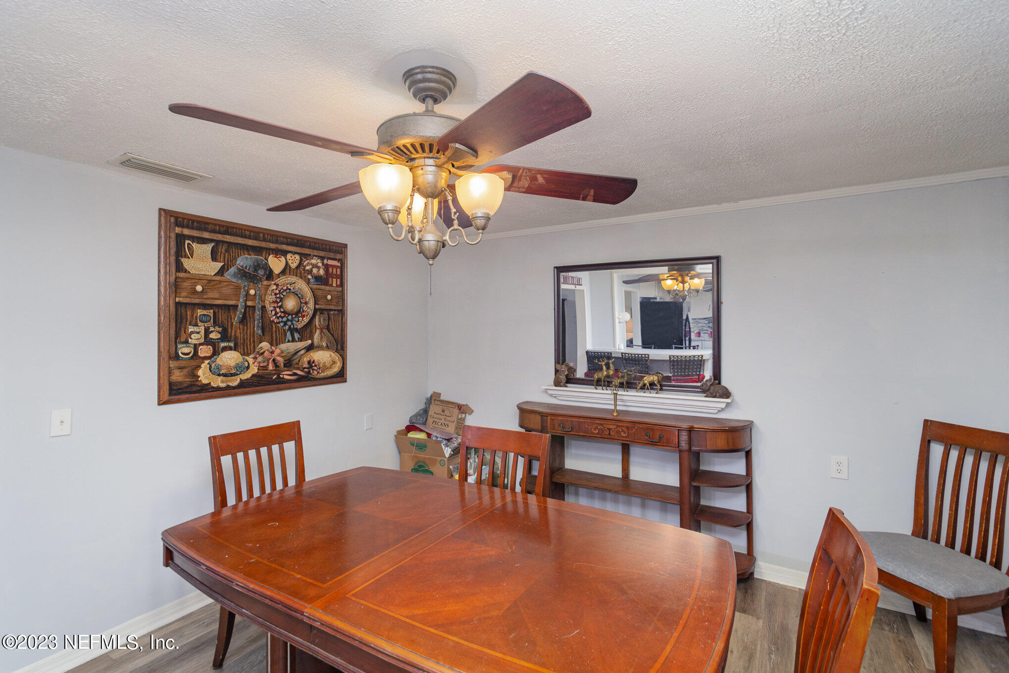145 North Orange Street Starke, FL 32091 - Photo 8 of 26 a view of a dining room with furniture
