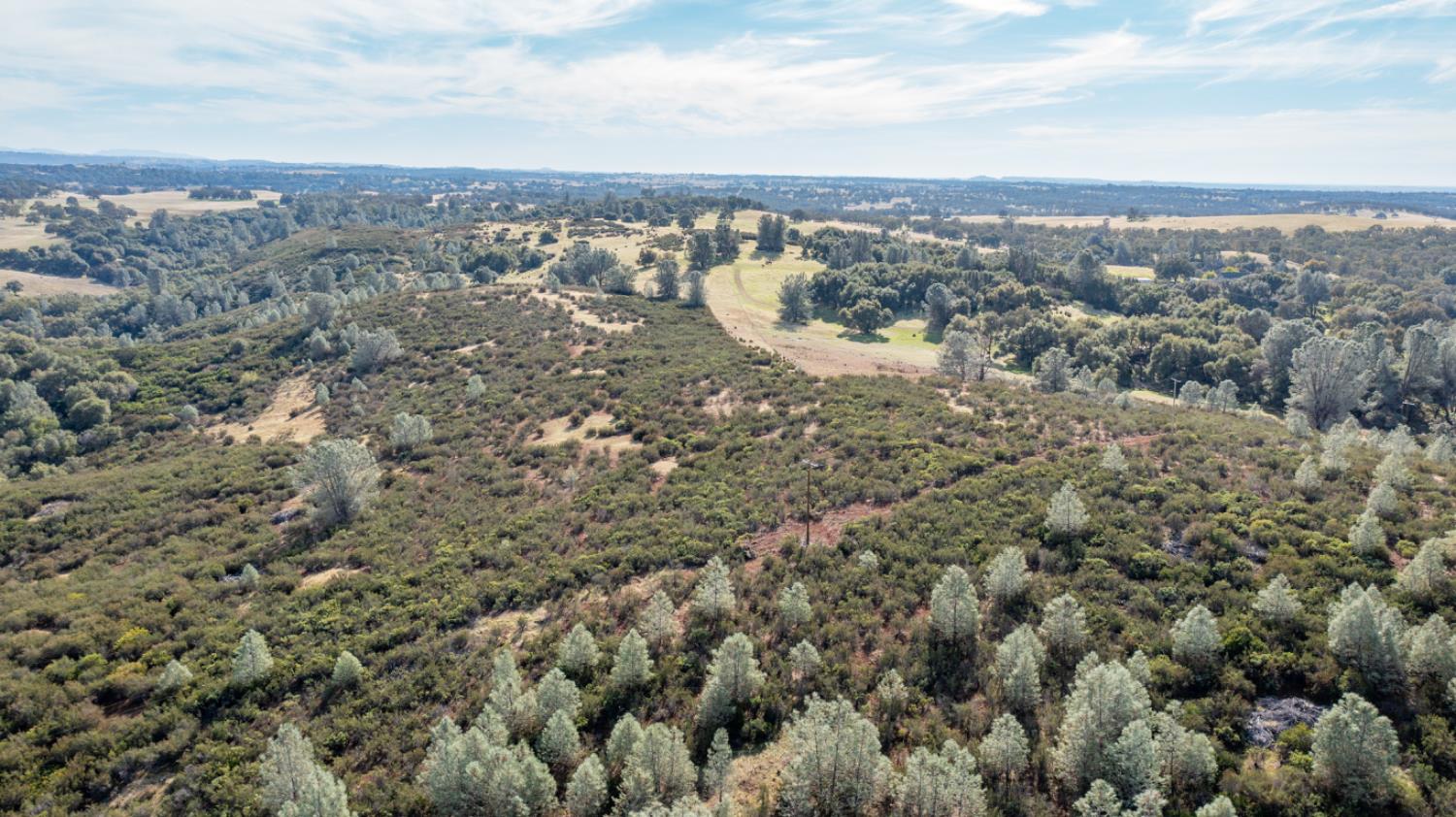 0 Latrobe Road Plymouth, CA 95669 - Photo 19 of 52 an aerial view of mountain with trees all around