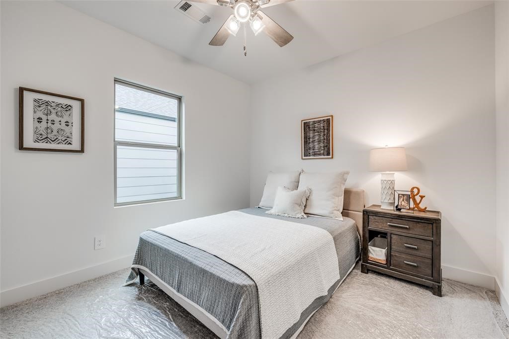 4403 Greeley Street Houston, TX 77006 - Photo 26 of 28 a bedroom with a bed and a window