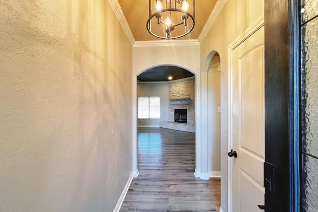 a view of entryway with wooden floor