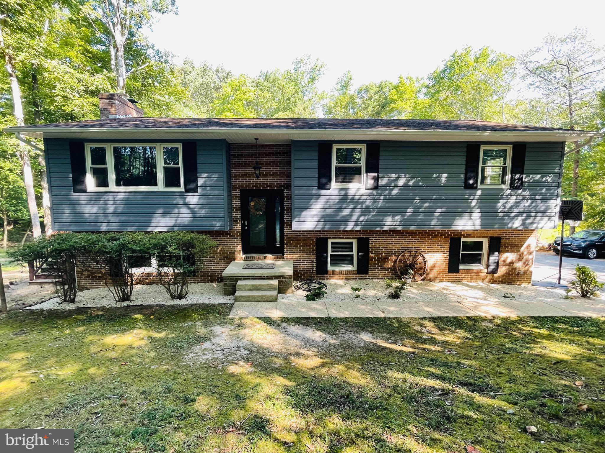 42194 Riva Ridge Drive Hollywood, MD 20636 - Photo 1 of 69 Shaded Front Yard