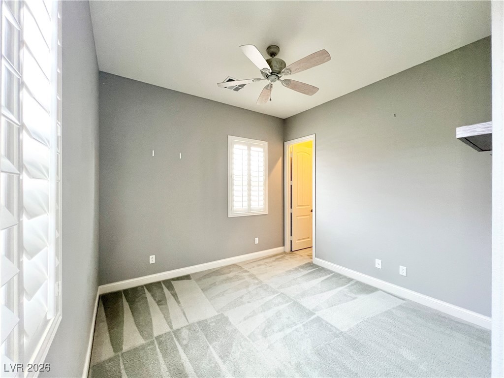 2117 Thames View Street Henderson, NV 89044 - Photo 28 of 50 3rd Bedroom with walk-in closet and ceiling fan