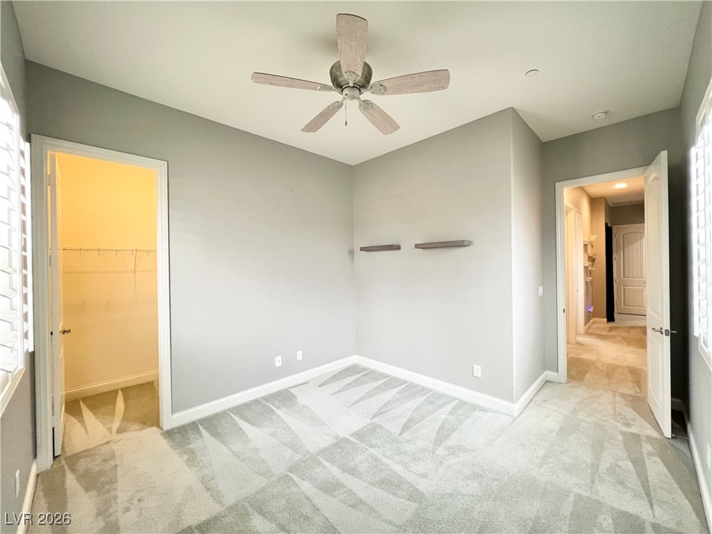 2117 Thames View Street Henderson, NV 89044 - Photo 29 of 50 3rd Bedroom with walk-in closet and ceiling fan