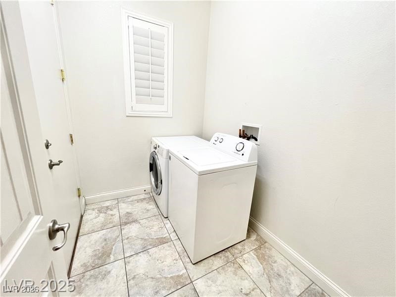 2117 Thames View Street Henderson, NV 89044 - Photo 30 of 50 Formal laundry room with washer and dryer