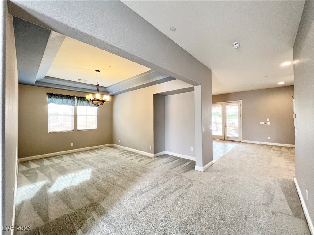 2117 Thames View Street Henderson, NV 89044 - Photo 7 of 50 Formal Dining Room and hallway to family room and kitchen