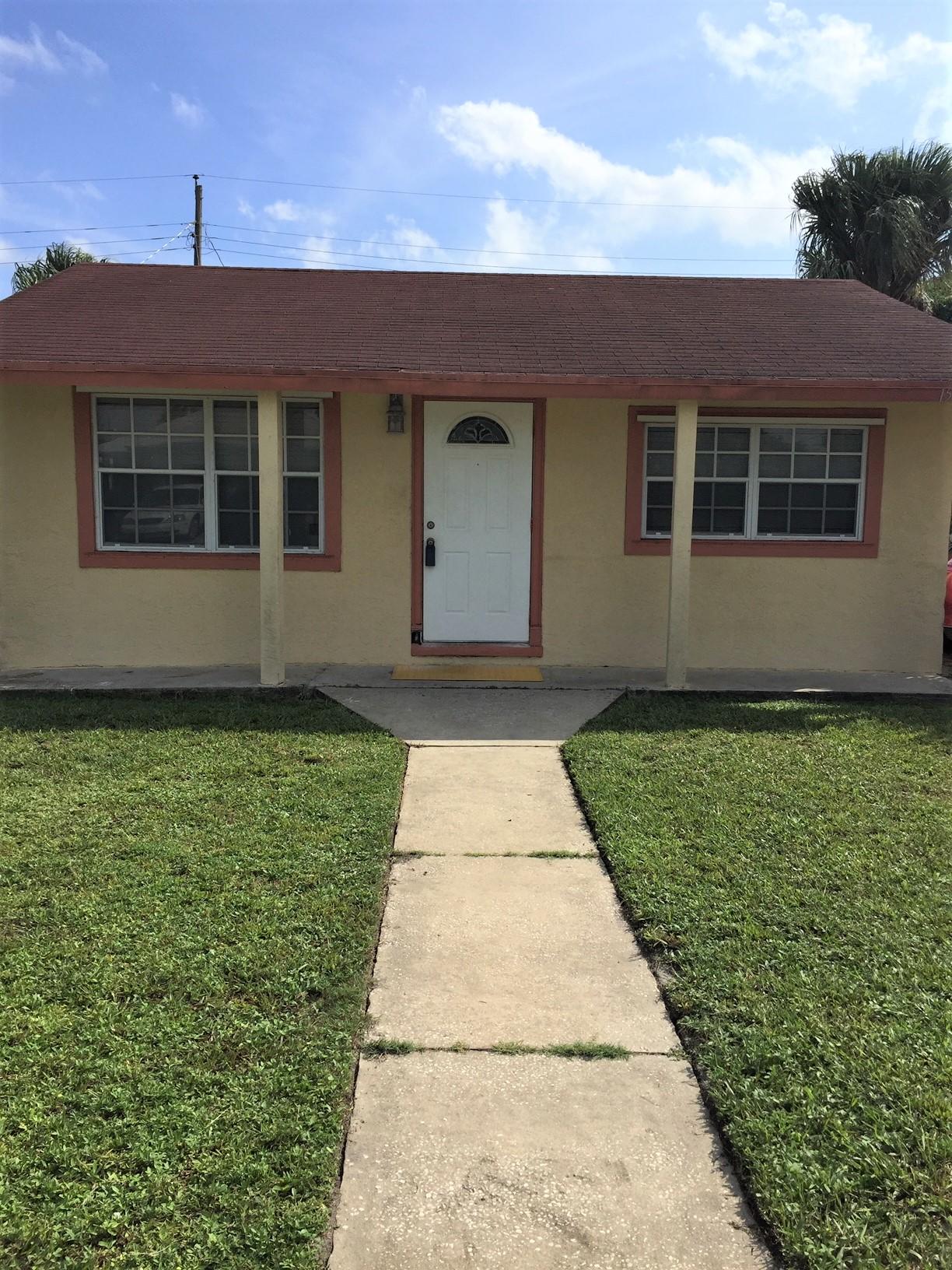 1573 West 17th Street Riviera Beach, FL 33404 - Photo 1 of 8 Front View 1