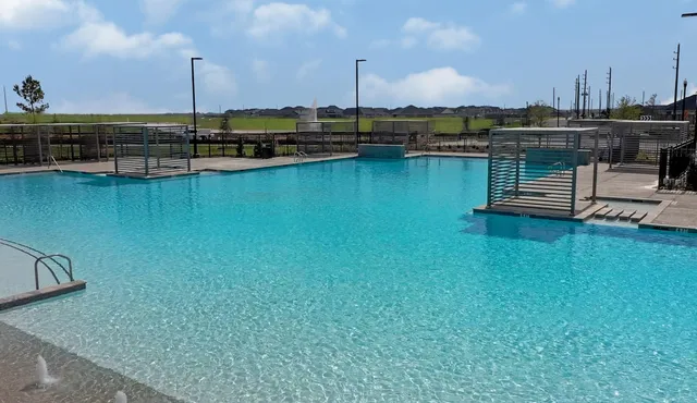 an aerial view of a and a swimming pool