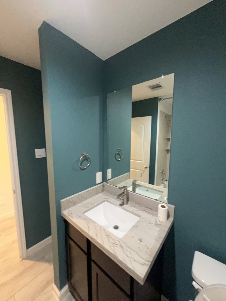 5327 Cherry Tallow Trail Katy, TX 77449 - Photo 13 of 18 a bathroom with a sink and a mirror