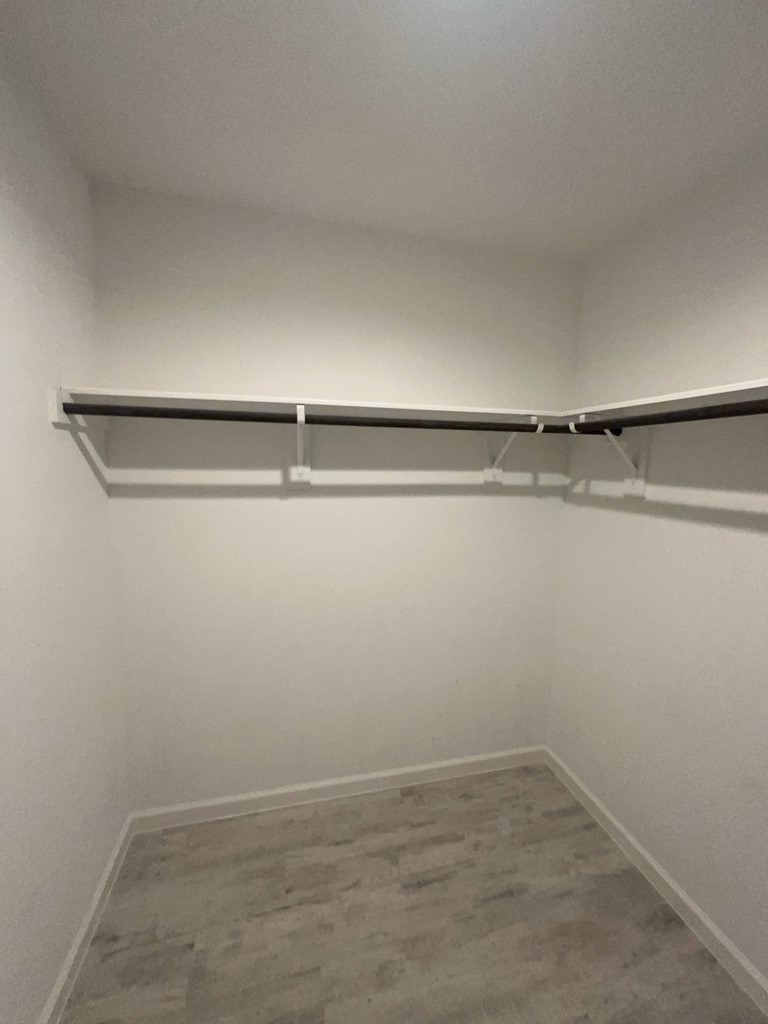 5327 Cherry Tallow Trail Katy, TX 77449 - Photo 10 of 18 a view of a room with racks on the wall