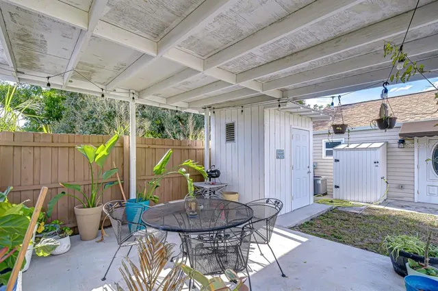 a view of a table and chairs in patio
