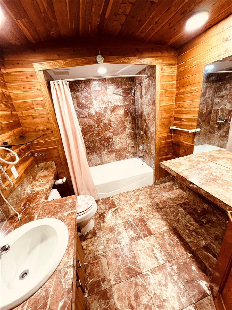 29625 Southwest 153rd Court Homestead, FL 33033 - Photo 14 of 17 a bathroom with a sink mirror and a shower