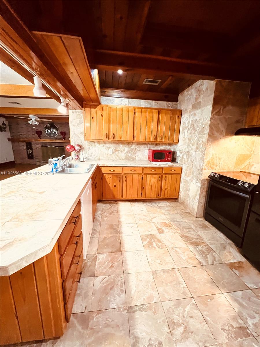 29625 Southwest 153rd Court Homestead, FL 33033 - Photo 10 of 17 a view of storage and utility room